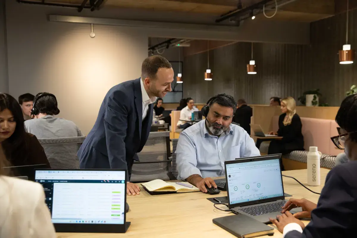 A Sereno advisor working through an issue alongside a colleague